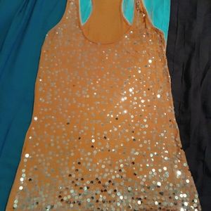Cute sequined razor-back styled shirt